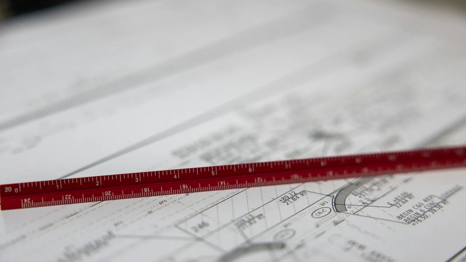 Architectural plans with a ruler and drawing tools