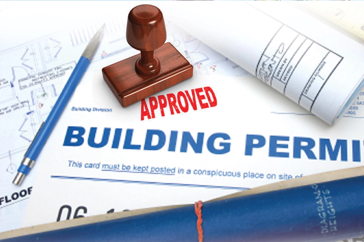 Impact window and door project documents being reviewed for permits, codes, and product approvals