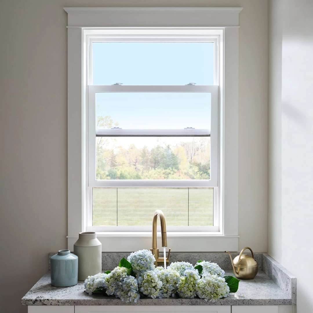 Detailed view of a single hung impact window and movable lower sash