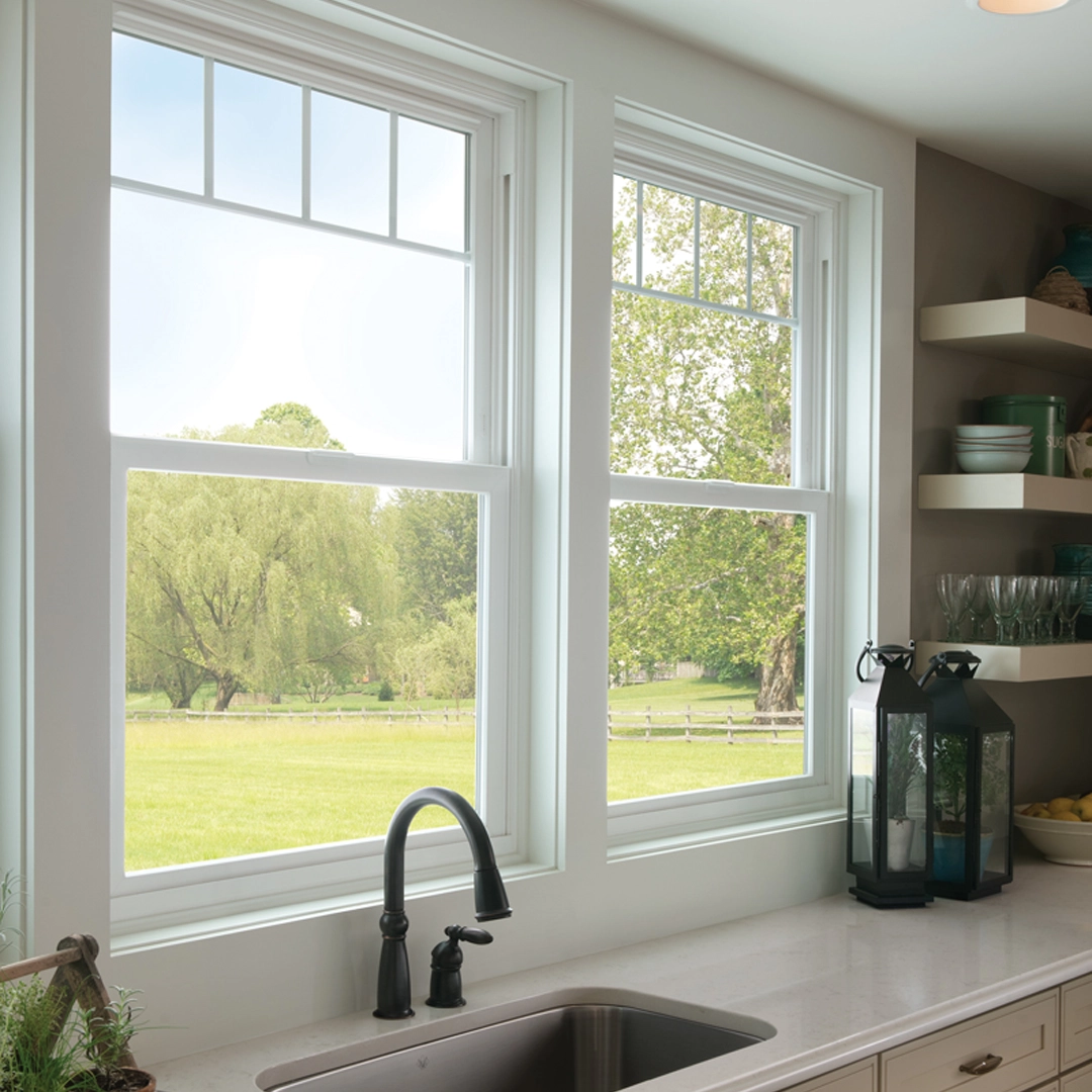 Single hung impact windows used across a residential exterior